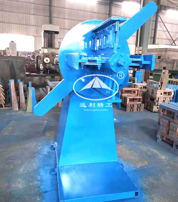 Single arm uncoiler